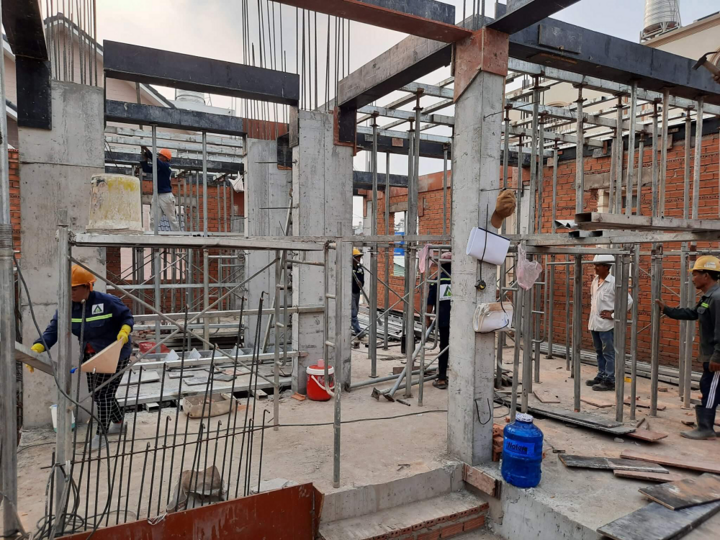 Bỏ giấy phép xây dựng: Người dân, doanh nghiệp bớt được khoản phí 'không tên' - Ảnh 2