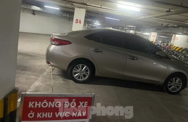 Cư dân khốn khổ vì dựng barie, hoán đổi công năng chỗ để xe tầng hầm chung cư - Ảnh 2