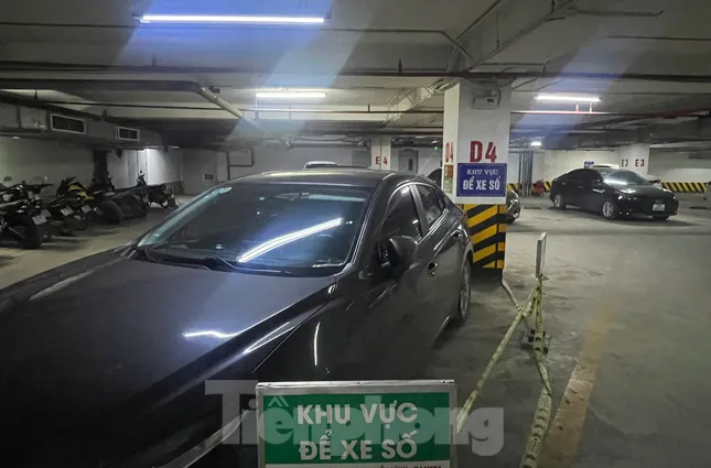 Cư dân khốn khổ vì dựng barie, hoán đổi công năng chỗ để xe tầng hầm chung cư - Ảnh 1