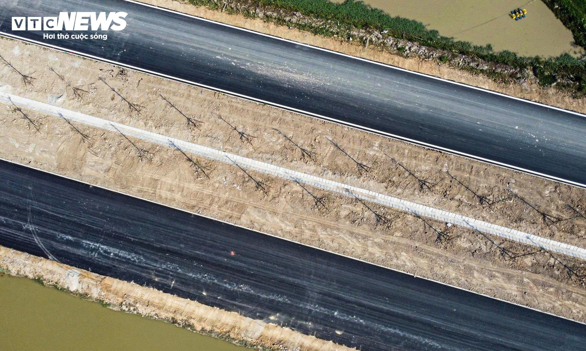 Đường trục phía Nam tăng tốc, chuẩn bị thông xe thêm 7km dịp Tết Nguyên đán - Ảnh 4